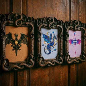 A dramatic gothic fantasy cross stitch bundle mockup showcasing an entire embroidery shop collection in one powerful visual. Displayed on a deep, moody background, the center text reads “515+ Entire Shop Cross Stitch Bundle – Lifetime Access,” highlighting the scale and value of this digital collection. Surrounding embroidery hoops feature gothic dragons, witchy symbols, moonlit castles, enchanted florals, dark fantasy creatures, and mystical designs. This image represents printable PDF cross