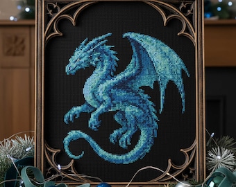 May include: Cross-stitch artwork featuring a blue dragon with detailed scales and wings, set against a black background. The framed art has a decorative, ornate border with a dark brown finish. The dragon is in a dynamic pose.