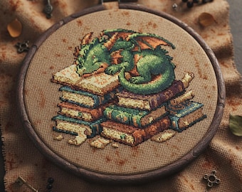 Schema punto croce "Drago libro addormentato": ricamo con drago fantasy accogliente su libri (PDF)