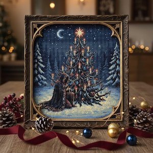 May include: Framed cross-stitch art featuring a Christmas tree adorned with candles and ornaments, set against a snowy forest backdrop under a starry night sky. The artwork is in a decorative wooden frame, with a figure kneeling near the tree.