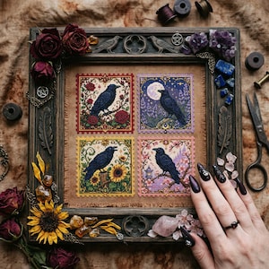 May include: A framed artwork featuring four cross-stitch designs of black ravens. Each design is set within a postage stamp-like border, depicting scenes with roses, a full moon, sunflowers, and cherry blossoms. The frame is dark wood, adorned with decorative elements.