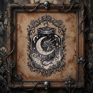 May include: Cross-stitch art featuring a dragon inside a jar, perched on a crescent moon, surrounded by stars. The artwork is framed in a dark wooden frame with decorative elements, including skulls and vines. The background has a vintage, aged appearance.