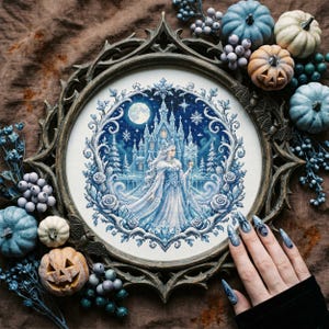 This stunning cross stitch pattern features an elegant ice queen standing before a glowing frozen castle under a full moon. Her flowing gown and cape are rendered in soft icy blues and whites, creating a shimmering, frost-like effect. The background is filled with delicate snowflakes and a deep winter night sky, enhancing the magical atmosphere. Surrounding the scene is an ornate circular frame of frosted roses and swirling icy branches, adding depth and decorative richness. This design is perfe
