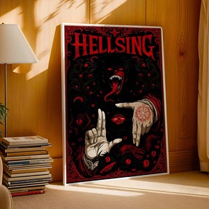May include: A framed poster with the word "HELLSING" in red gothic lettering. The artwork features a dark, detailed illustration with red and black elements, including a monster with a long tongue and hands with intricate tattoos.