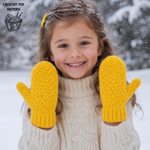 May include: A pair of bright yellow crocheted mittens with a ribbed cuff and a textured stitch pattern. The image includes the text CROCHET PDF PATTERN and a graphic of a basket with yarn balls and knitting needles in the upper left corner.