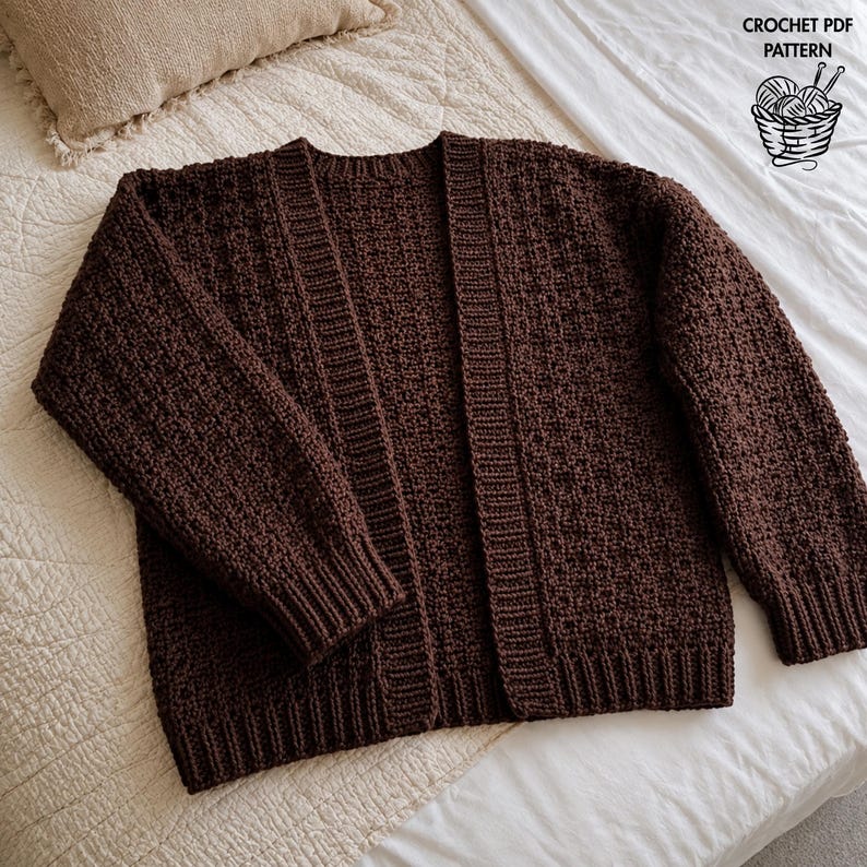 May include: A dark brown crochet cardigan featuring a textured stitch pattern, long sleeves, and ribbed cuffs and hem. The front is open with a vertical ribbed placket. The text CROCHET PDF PATTERN is visible in the top right corner.