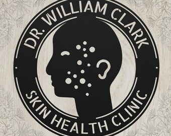 May include: A circular black metal sign featuring a silhouette of a human head in profile. The text DR. WILLIAM CLARK is arched at the top, and SKIN HEALTH CLINIC is arched at the bottom. The silhouette includes a pattern of circular dots.