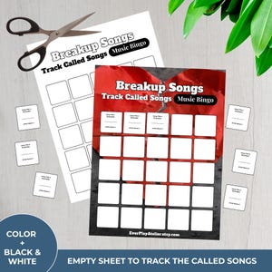 May include: Two "Breakup Songs Music Bingo" sheets with blank squares and small cards. One sheet is white, the other is red with a heart design. Black scissors are on the white sheet. Text includes "Track Called Songs" and "EverPlayAtelier.etsy.com".