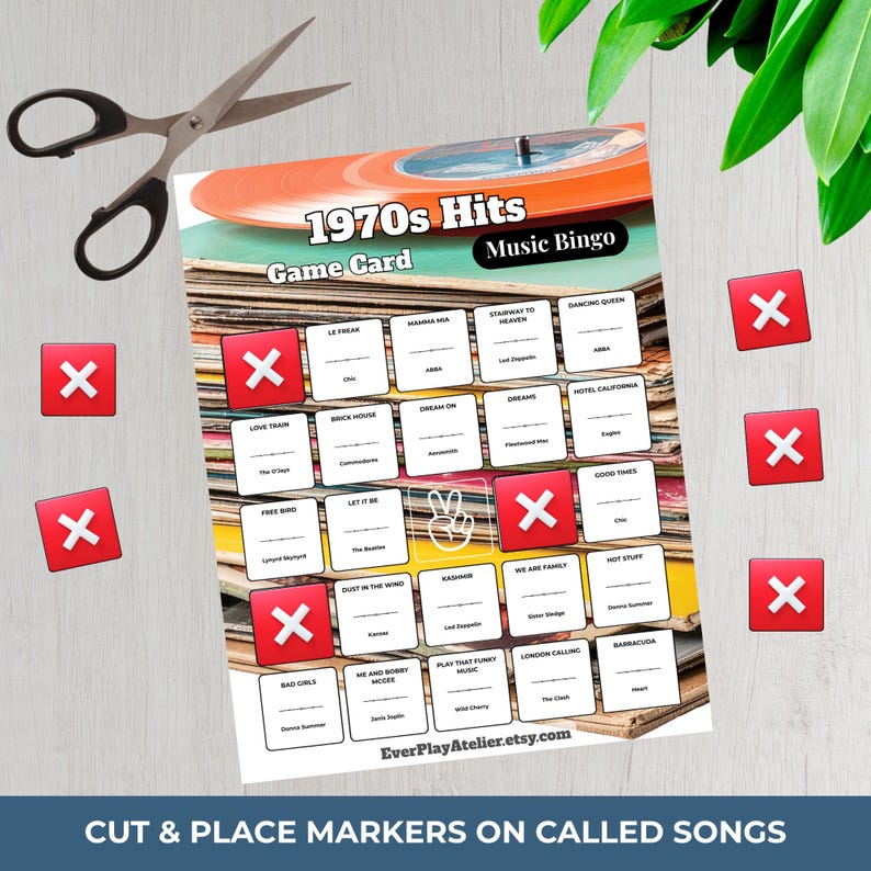 May include: A 1970s Hits Music Bingo game card with song titles, red X markers, and scissors. The card features a vinyl record graphic and the text "Cut & Place Markers on Called Songs."