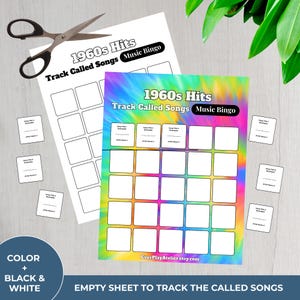 May include: Two sheets of 1960s Hits Music Bingo, one white and one with a tie-dye background. The white sheet has blank squares and the text "Track Called Songs Music Bingo". Scissors are at the top. Small cards are scattered around.
