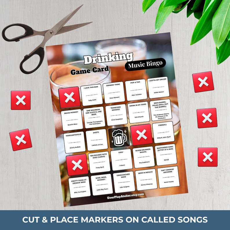 May include: A printed "Drinking Music Bingo" game card with song titles, beer glasses, and red "X" markers. Includes scissors and green leaves. The game card features the text "Drinking Game Card Music Bingo" and the Etsy shop name.