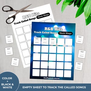 May include: Two R&B Hits Music Bingo sheets with the text "Track Called Songs" are displayed. One sheet is white, the other is blue. Small white cards and a pair of scissors are also present. The text "EverPlayAtelier.etsy.com" is visible.