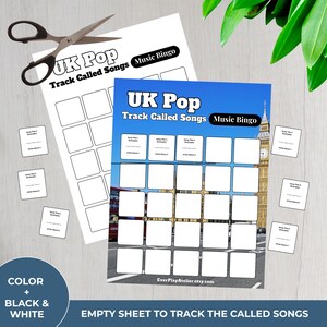 以下が含まれることがあります： 「UK Pop Track Called Songs Music Bingo」のテキストが入った2枚のUK Popミュージックビンゴゲームシート。メインカードは、ロンドンのシーンがある青い空の背景です。小さなカードとハサミが含まれています。