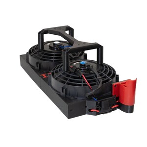 May include: Dual electric radiator fan assembly. The assembly features two black fans with protective grilles, mounted on a black base. A red component is attached to the side, with wiring visible. The fans are connected by a black support structure.