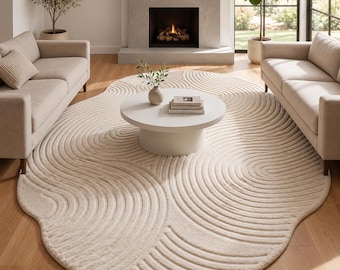 Alfombra Zen irregular tallada - Alfombra texturizada 3D de forma orgánica color crema tejida a mano para una decoración de lujo minimalista en la sala de estar.