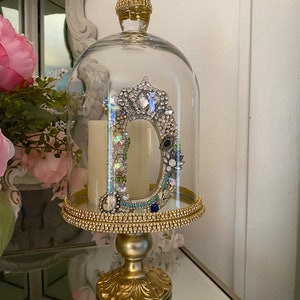 An elegant style raised gold tray with a glass dome/Cloche, rhinestones
