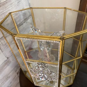 A decorative vintage glass and Brass table curio cabinet, Rhinestone display shelf