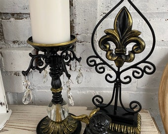 Black and gold shelf fillers, 3 pieces, metal Fleur de lis, candle holder and a cherub statue