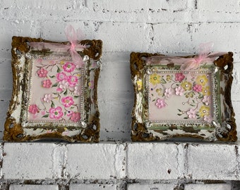 A pair of floral wall pictures, hand painted flowers, paper, crystals, distressed rust