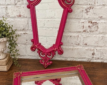 A set two mirrors, Baroque frames in magenta and gold, wall mirror,  or tray