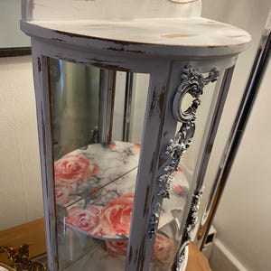 Vintage Tabletop curio cabinet, rounded glass, white distressed shelf, shabby pink roses, display cabinet