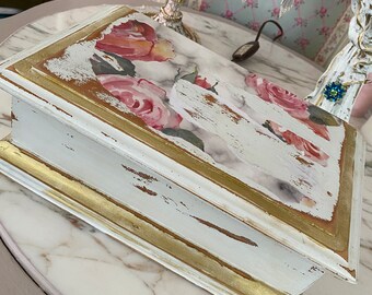 A shabby distressed storage box, removable top tray, torn paper design.