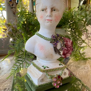 A redesigned Lady bust, women statue, rhinestones