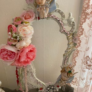 Shabby opened framed wall hanging, A pair of Norcrest Crowned angels, rhinestones and roses