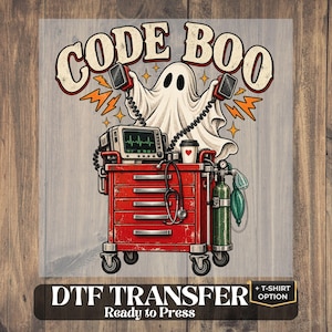 May include: A DTF transfer graphic featuring a ghost holding two defibrillator paddles above a red medical crash cart. The cart holds a heart monitor, a stethoscope, and a coffee cup. The text CODE BOO appears at the top in a retro font.