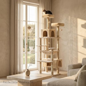 May include: A multi-level beige cat tree with multiple platforms, cubby holes, and a hammock. A brown and black cat sits atop the highest platform. The text "For the Home They Deserve" is at the bottom of the image.