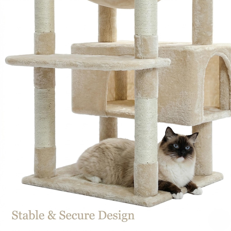 May include: Beige cat tree with multiple levels, platforms, and a hideaway cubby. The posts are wrapped in sisal rope. A fluffy cat with brown and white markings is resting on the base. Text at the bottom reads "Stable & Secure Design."