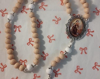 Handmade pale pink and white wooden rosary | Saint Thérèse of Lisieux