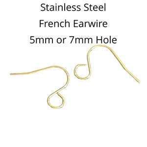 May include: Two gold-colored French earwires made of stainless steel. The text in the image reads "Stainless Steel French Earwire 5mm or 7mm Hole". The earwires are designed for jewelry making.