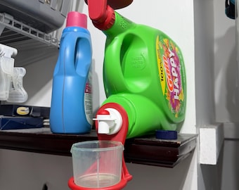laundry detergent cup holder, and drain