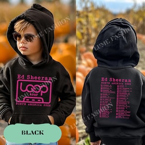 May include: Black hooded sweatshirt featuring the text "Ed Sheeran Loop Tour North America 2026" in pink. The back of the sweatshirt displays a list of tour dates. The sweatshirt has a front pocket and a hood.