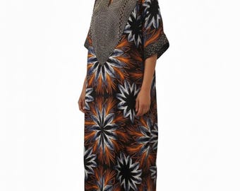 Ankara Maxi Dress – Bold Sunburst Floral Print (Orange, Black & White)