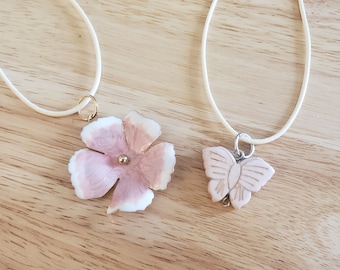 Handmade Upcycled Necklace, flower or butterfly pendant on off white cord, ecofashion