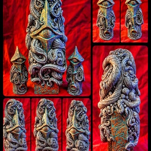 May include: Five decorative ceramic sculptures with a textured, organic, and abstract design. The sculptures are painted in shades of silver, gold, and turquoise. The sculptures are all different sizes and shapes, but they all have a similar style.