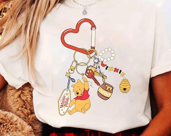 ディズニーくまのプーさんキーホルダーTシャツ、ディズニーランドバケーションファミリーアウトフィット、プーさんと仲間のシャツ、100エーカーの森ディズニーワールドアニマルキングダム