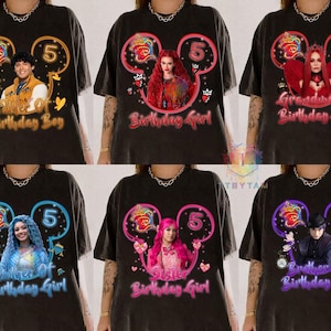 May include: Six black t-shirts featuring character graphics inside Mickey Mouse ear outlines with the number 5. Text includes Father of Birthday Boy, Birthday Girl, Grandmother Birthday Girl, Mother of Birthday Girl, Sister Birthday Girl, and Brother of Birthday Boy.