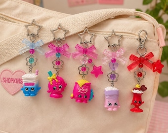 Porte-clés Shopkins | Breloques de sac kawaii mignonnes | Porte-clés nœud pastel | Accessoires de collection | Cadeau mignon style années 2000 | Choisissez le vôtre