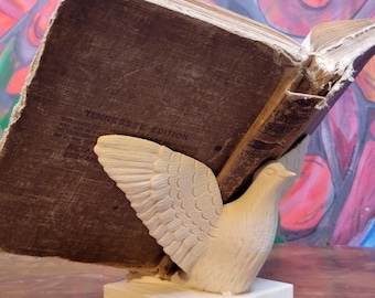 The Messenger’s Open Wings Book Display