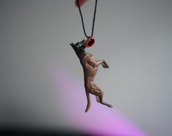 Car hanging ornament - Belgian Malinois catching a tug sleeve k9 bite toy