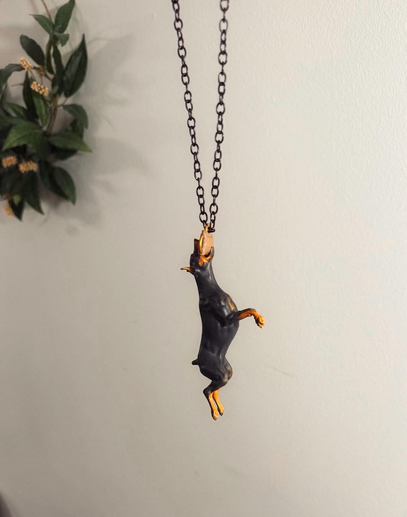 Car hanging ornament - Doberman catching a tug bite toy image 6