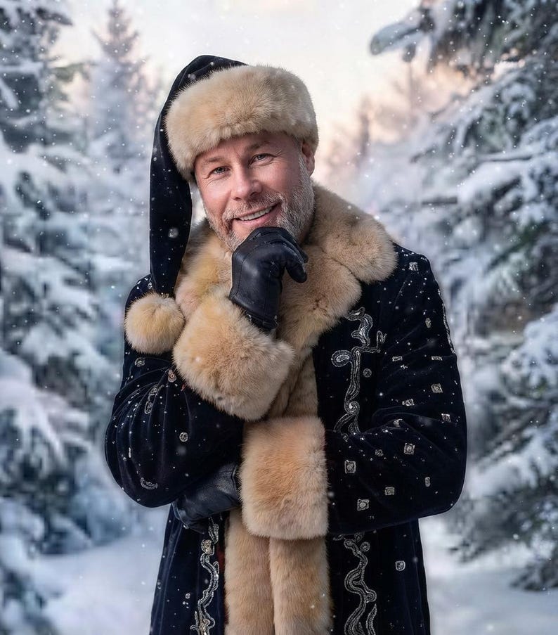 May include: A dark blue velvet coat with silver embroidery and thick beige faux fur trim on the collar and cuffs. The coat is paired with a matching dark blue velvet hat featuring a beige faux fur brim and a pom-pom, plus black leather gloves.
