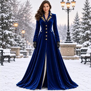 May include: A floor-length royal blue velvet coat featuring a structured collar with gold leaf embroidery, long sleeves, and a front button closure with gold buttons. The coat has a fitted bodice and a flared skirt with a white lining visible.
