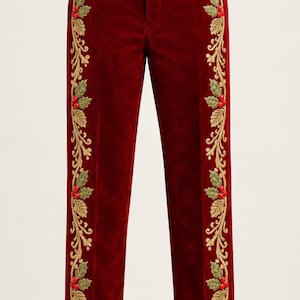 May include: Deep red velvet trousers featuring a vertical embroidered pattern along each outer leg. The embroidery consists of gold scrolling vines, green holly leaves, and small red berries running from the waistband to the hemline.