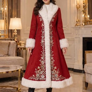 May include: A long red coat featuring a white faux fur collar, cuffs, and hem. The coat is decorated with intricate silver and gold floral embroidery along the front opening and lower panels. It is paired with black pointed-toe heeled boots.