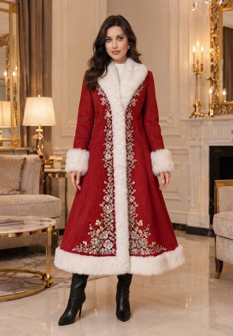 May include: A long red coat featuring a white faux fur collar, cuffs, and hem. The coat is decorated with intricate silver and gold floral embroidery along the front opening and lower panels. It is paired with black pointed-toe heeled boots.