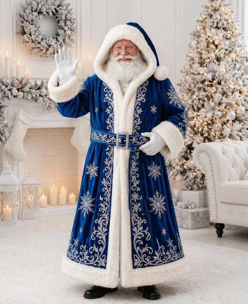 May include: A floor-length royal blue velvet coat with a hood, featuring thick white faux fur trim on the cuffs, hem, and front opening. The coat is decorated with intricate silver embroidery and snowflake patterns, secured by a matching belt.